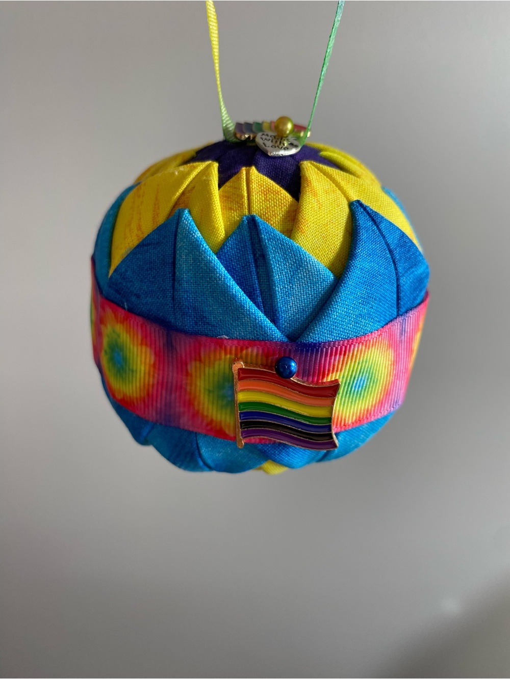 Pride Hand Crafted Quilted Ornament with Tie Dye Ribbon and Rainbow Charms
